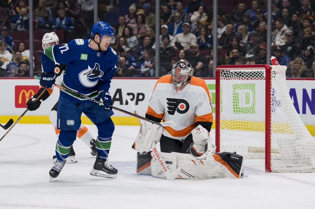 Feb 18, 2023; Vancouver, British Columbia, CAN; Vancouver Canucks forward Anthony Beauvillier (72) attempts a redirect on Philadelphia Flyers goalie Carter Hart (79) in the first period at Rogers Arena. Mandatory Credit: Bob Frid-USA TODAY Sports