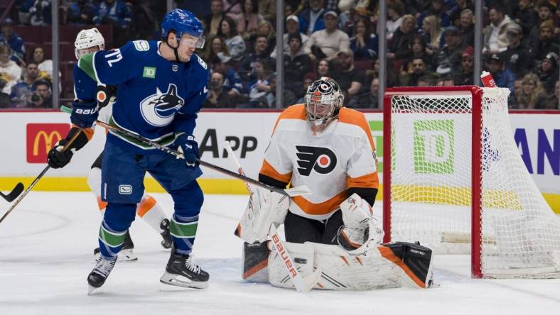 Feb 18, 2023; Vancouver, British Columbia, CAN; Vancouver Canucks forward Anthony Beauvillier (72) attempts a redirect on Philadelphia Flyers goalie Carter Hart (79) in the first period at Rogers Arena. Mandatory Credit: Bob Frid-USA TODAY Sports