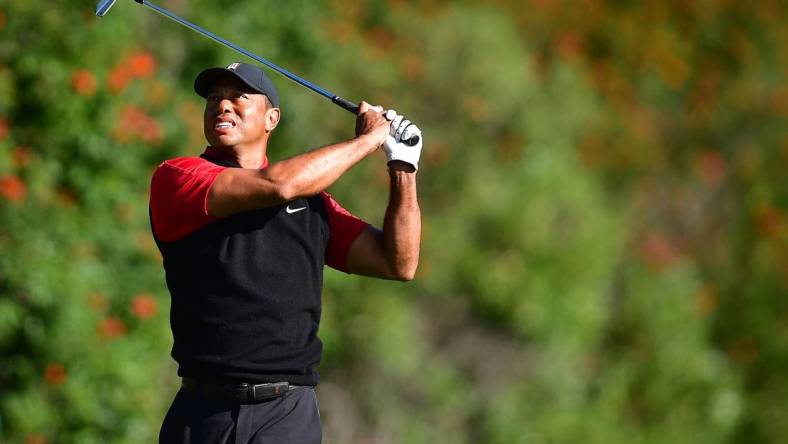 Feb 19, 2023; Pacific Palisades, California, USA; Tiger Woods hits from the fourth hole tee during the final round of The Genesis Invitational golf tournament. Mandatory Credit: Gary A. Vasquez-USA TODAY Sports