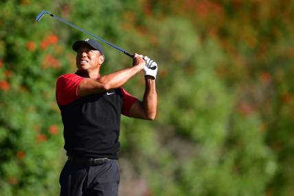 Feb 19, 2023; Pacific Palisades, California, USA; Tiger Woods hits from the fourth hole tee during the final round of The Genesis Invitational golf tournament. Mandatory Credit: Gary A. Vasquez-USA TODAY Sports