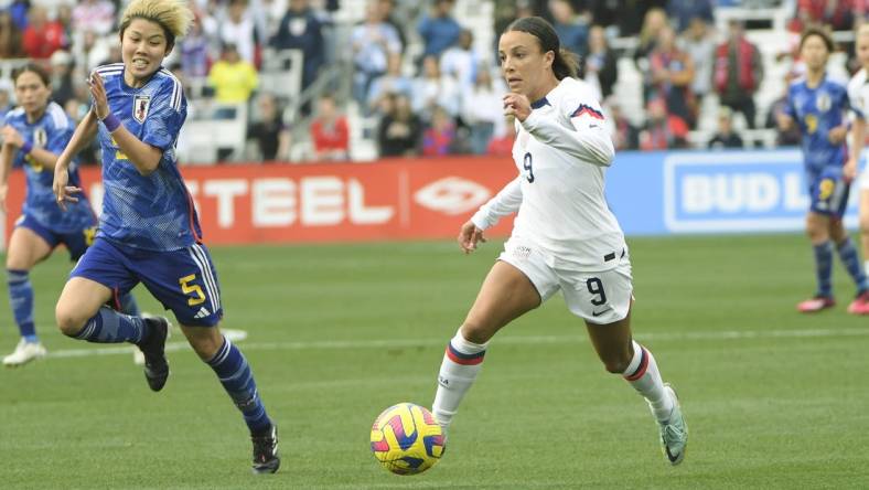 Feb 19, 2023; Nashville, Tennessee, USA;  United States of America forward Mallory Swanson (9) dribbles against the Japan during the first half at Geodis Park. Mandatory Credit: Steve Roberts-USA TODAY Sports