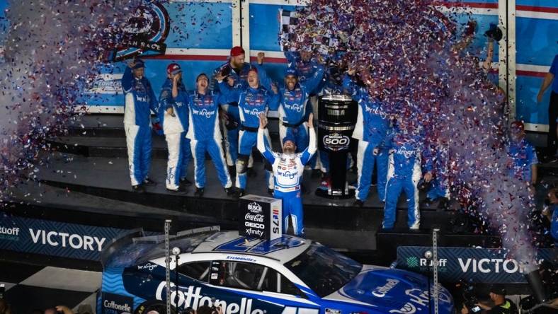 Feb 19, 2023; Daytona Beach, Florida, USA; NASCAR Cup Series driver Ricky Stenhouse Jr celebrates after winning the Daytona 500 at Daytona International Speedway. Mandatory Credit: Mark J. Rebilas-USA TODAY Sports