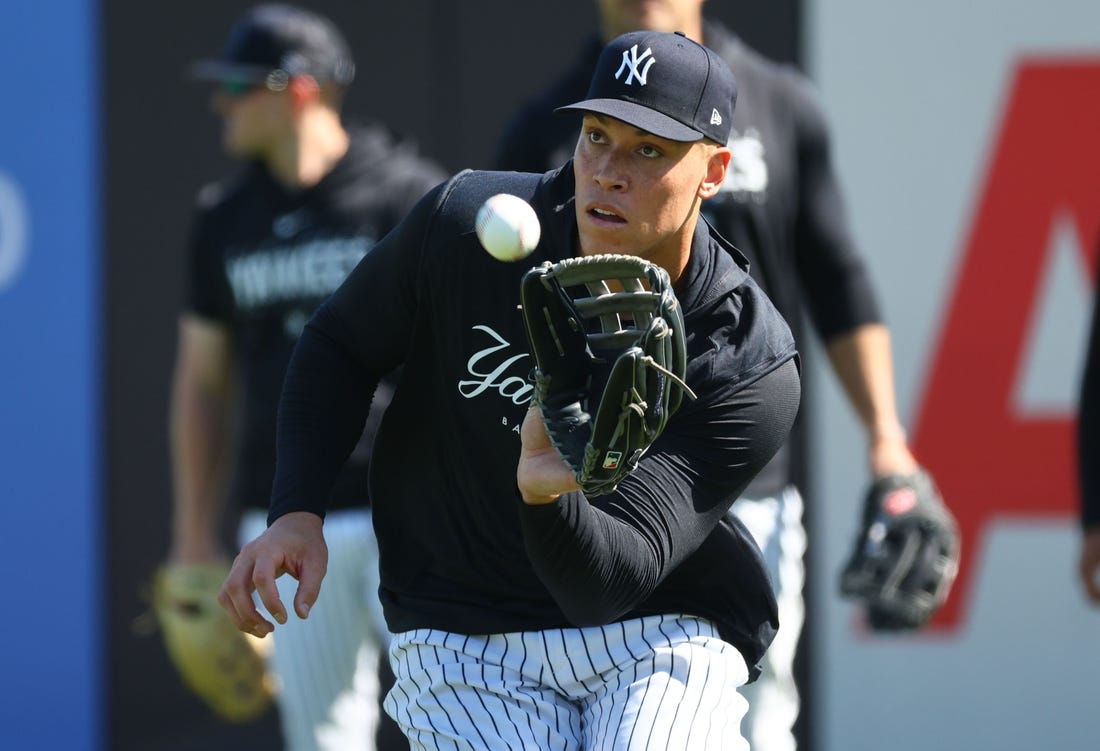 Feb 20, 2023; Tampa, FL, USA; New York Yankees center fielder Aaron Judge (99) works out during spring training practice at George M Steinbrenner Field. Mandatory Credit: Kim Klement-USA TODAY Sports