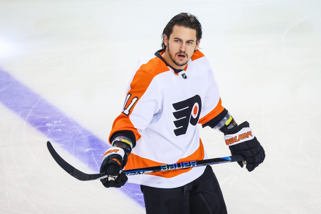 Feb 20, 2023; Calgary, Alberta, CAN; Philadelphia Flyers right wing Travis Konecny (11) skates during the warmup period against the Calgary Flames at Scotiabank Saddledome. Mandatory Credit: Sergei Belski-USA TODAY Sports