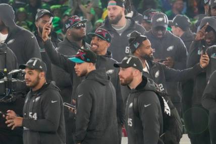 Philadelphia Eagles quarterback Jalen Hurts takes a picture on stage at the Footprint Center in downtown Phoenix during the NFL's Super Bowl Opening Night on Feb. 6, 2023.

Nfl Super Bowl Opening Night At Footprint Center