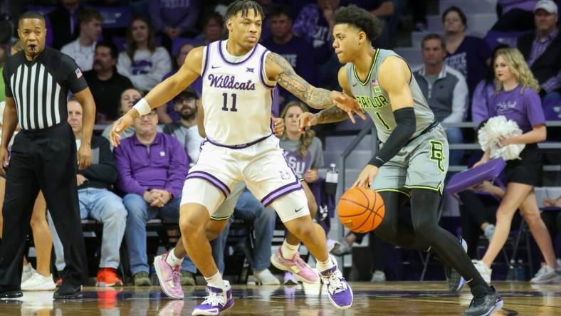 Feb 21, 2023; Manhattan, Kansas, USA; Baylor Bears guard Keyonte George (1) is guarded by Kansas State Wildcats guard Keyontae Johnson (11) during the first half at Bramlage Coliseum. Mandatory Credit: Scott Sewell-USA TODAY Sports