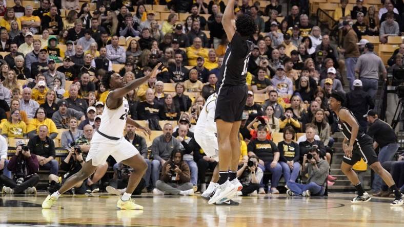 Feb 21, 2023; Columbia, Missouri, USA; Mississippi State Bulldogs forward Will McNair Jr. (13) shoots as Missouri Tigers guard Kobe Brown (24) defends during the first half at Mizzou Arena. Mandatory Credit: Denny Medley-USA TODAY Sports