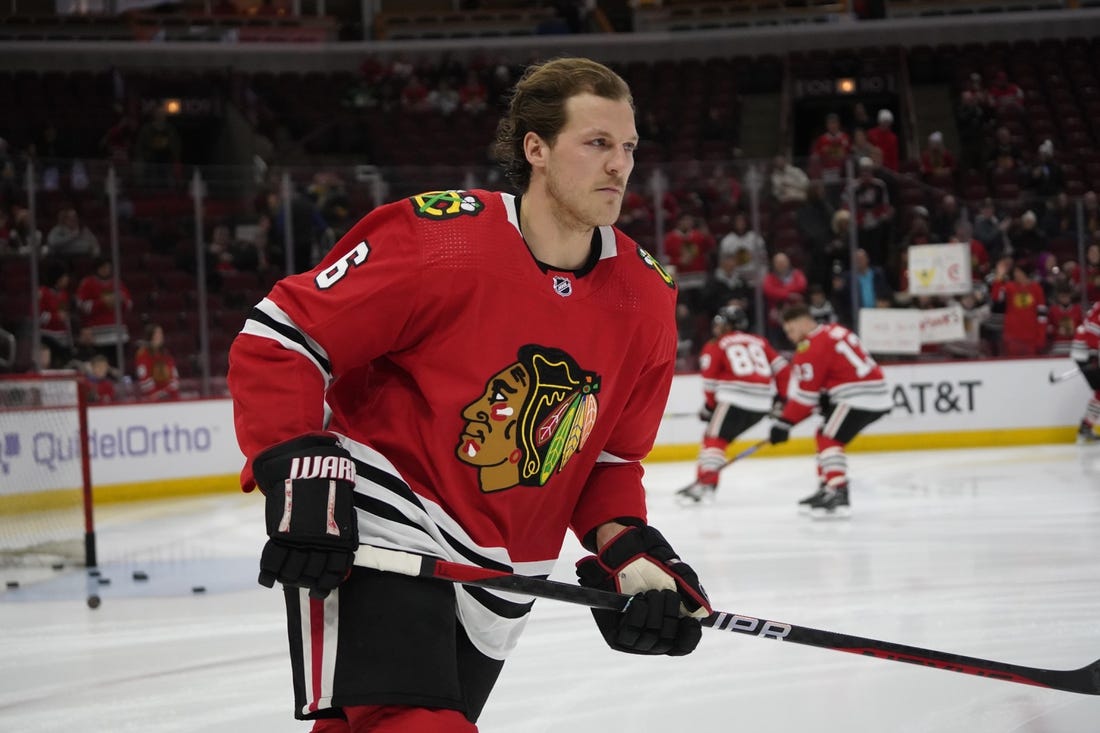 Feb 21, 2023; Chicago, Illinois, USA; Chicago Blackhawks defenseman Jake McCabe (6) warms up before the game against the Vegas Golden Knights at United Center. Mandatory Credit: David Banks-USA TODAY Sports