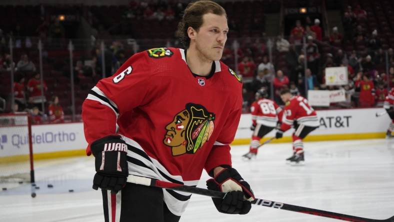 Feb 21, 2023; Chicago, Illinois, USA; Chicago Blackhawks defenseman Jake McCabe (6) warms up before the game against the Vegas Golden Knights at United Center. Mandatory Credit: David Banks-USA TODAY Sports