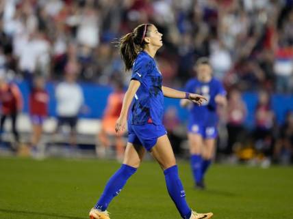 Feb 22, 2023; Frisco, Texas, USA; United States of America forward Alex Morgan (13) reacts after scoring a goal against Brazil during the first half at Toyota Stadium. Mandatory Credit: Chris Jones-USA TODAY Sports