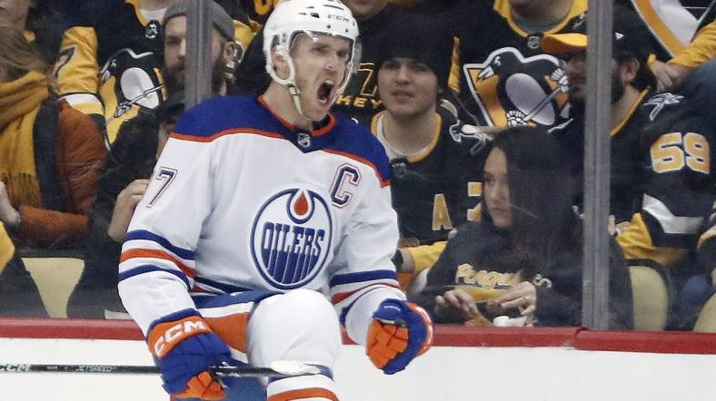 Feb 23, 2023; Pittsburgh, Pennsylvania, USA; Edmonton Oilers center Connor McDavid (97) reacts after scoring a goal against the Pittsburgh Penguins during the first period at PPG Paints Arena. Mandatory Credit: Charles LeClaire-USA TODAY Sports