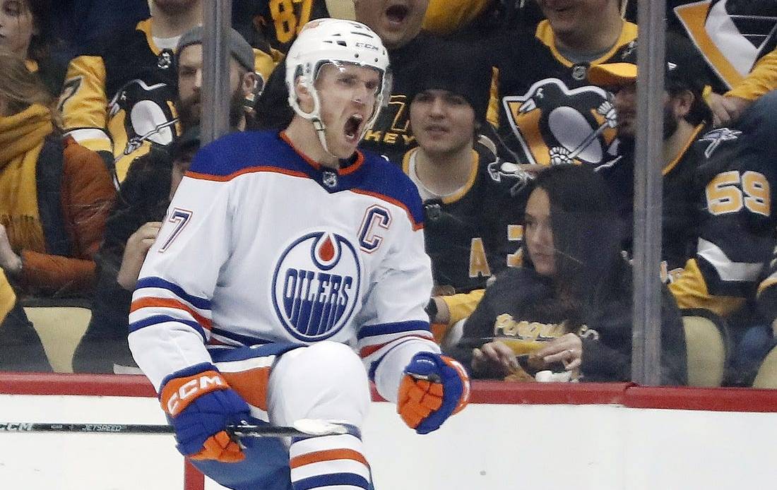 Feb 23, 2023; Pittsburgh, Pennsylvania, USA; Edmonton Oilers center Connor McDavid (97) reacts after scoring a goal against the Pittsburgh Penguins during the first period at PPG Paints Arena. Mandatory Credit: Charles LeClaire-USA TODAY Sports