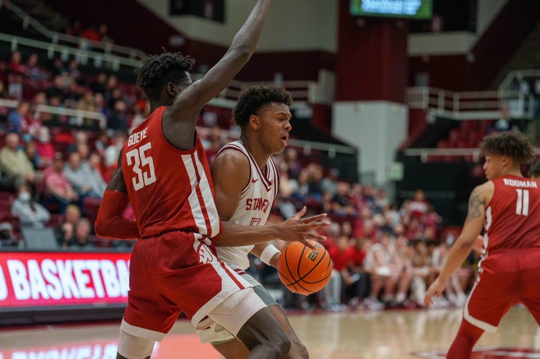 Feb 23, 2023; Stanford, California, USA;  Stanford Cardinal forward Harrison Ingram (55) drive to the net against Washington State Cougars forward Mouhamed Gueye (35) during the first half at Maples Pavilion. Mandatory Credit: Neville E. Guard-USA TODAY Sports