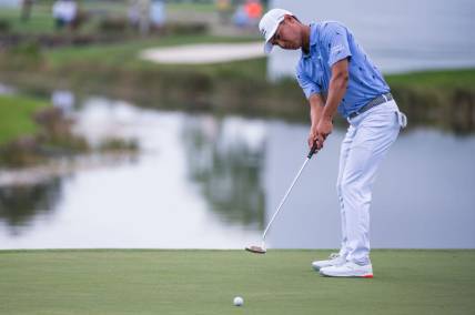 Justin Suh putts on the 17th green during the second round of the Honda Classic at PGA National Resort & Spa on Friday, February 24, 2023, in Palm Beach Gardens, FL.