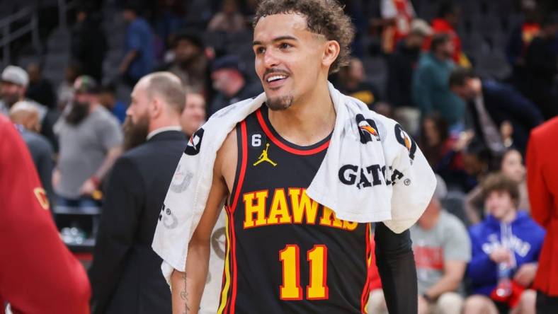 Feb 24, 2023; Atlanta, Georgia, USA; Atlanta Hawks guard Trae Young (11) celebrates after a victory against the Cleveland Cavaliers at State Farm Arena. Mandatory Credit: Brett Davis-USA TODAY Sports