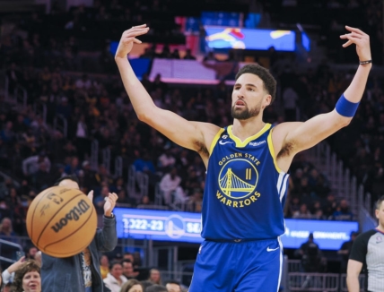 Feb 24, 2023; San Francisco, California, USA; Golden State Warriors guard Klay Thompson (11) gestures towards fans as a time out if called during the fourth quarter against the Houston Rockets at Chase Center. Mandatory Credit: Kelley L Cox-USA TODAY Sports