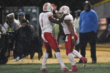 Feb 25, 2023; Las Vegas, NV, USA; D.C. Defenders quarterback D'Eriq King (3) celebrates with wide receiver Chris Blair (1) after scoring a touchdown against the Vegas Vipers in the fourth quarter at Cashman Field. Mandatory Credit: Candice Ward-USA TODAY Sports