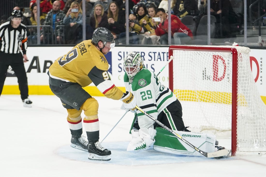 Feb 25, 2023; Las Vegas, Nevada, USA; Dallas Stars goaltender Jake Oettinger (29) makes a save against Vegas Golden Knights center Jack Eichel (9) during a shootout at T-Mobile Arena. Mandatory Credit: Lucas Peltier-USA TODAY Sports