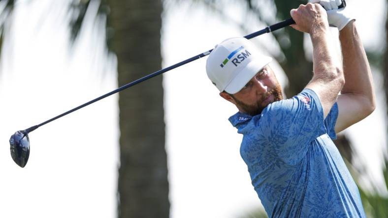 Feb 26, 2023; Palm Beach Gardens, Florida, USA; Chris Kirk plays his shot from the second tee during the final round of the Honda Classic golf tournament. Mandatory Credit: Sam Navarro-USA TODAY Sports