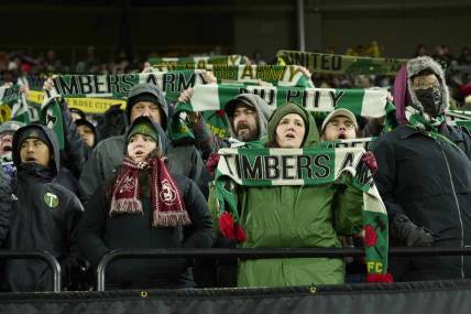 Feb 27, 2023; Portland, Oregon, USA; Portland Timbers fans sing a song during the second half during a game against Sporting Kansas City at Providence Park. Mandatory Credit: Troy Wayrynen-USA TODAY Sports