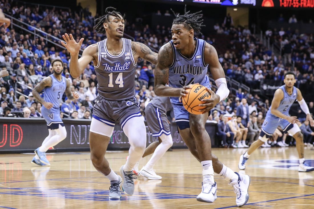 Feb 28, 2023; Newark, New Jersey, USA;  Villanova Wildcats forward Brandon Slater (34) looks to drive past Seton Hall Pirates guard Dre Davis (14) in the first half at Prudential Center. Mandatory Credit: Wendell Cruz-USA TODAY Sports