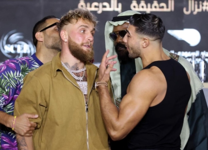 Jake Paul and Tommy Fury clash as Derek Chisora and Jake Paul's manager Nakisa Bidarian intervene during the press conference in Riyadh, Saudi Arabia on Feb. 23, 2023.