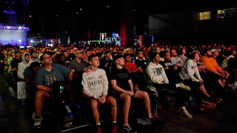 Jul 21, 2019; Miami Beach, FL, USA; Fans watch the gameplay between Reciprocity and GEN.G during the Call of Duty League Finals e-sports event at Miami Beach Convention Center. Mandatory Credit: Jasen Vinlove-USA TODAY Sports