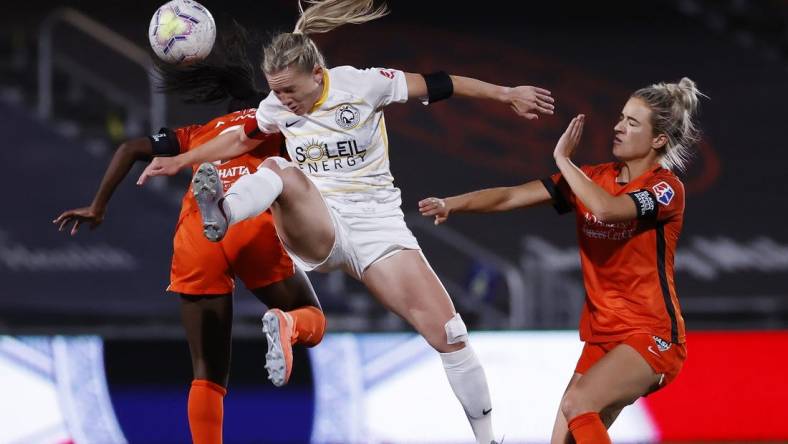 Jul 17, 2020; Herriman, Utah, USA; Houston Dash forward Nichelle Prince (8) and Utah Royals FC forward Amy Rodriguez (8) battle for the ball in the second half at Zions Bank Stadium. Mandatory Credit: Jeffrey Swinger-USA TODAY Sports