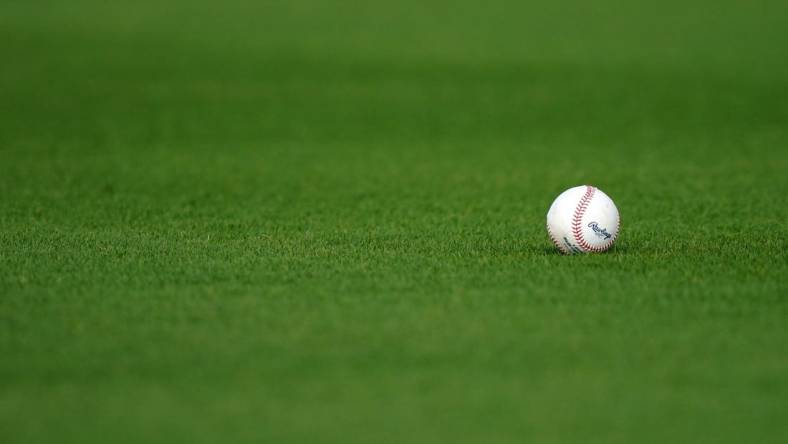 Feb 22, 2021; West Palm Beach, Florida, USA; A general view of a baseball in the grass during Houston Astros spring training workouts at The Ballpark of the Palm Beaches. Mandatory Credit: Jasen Vinlove-USA TODAY Sports