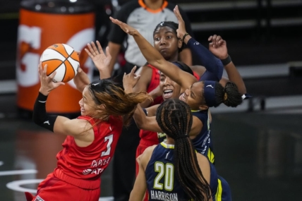 May 27, 2021; College Park, Georgia, USA; Atlanta Dream guard Chennedy Carter (3) comes away with a rebound against the Dallas Wings during the second half at Gateway Center Arena at College Park. Mandatory Credit: Dale Zanine-USA TODAY Sports