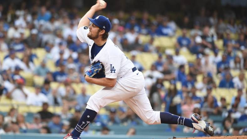 Jun 28, 2021; Los Angeles, California, USA;  Los Angeles Dodgers starting pitcher Trevor Bauer (27) pitches against the San Francisco Giants in the first inning at Dodger Stadium. Mandatory Credit: Richard Mackson-USA TODAY Sports