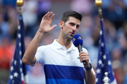 Sep 12, 2021; Flushing, NY, USA; Novak Djokovic of Serbia speaks to the crowd during the trophy presentation ceremony after his match against Daniil Medvedev of Russia (not pictured) in the men's singles final on day fourteen of the 2021 U.S. Open tennis tournament at USTA Billie Jean King National Tennis Center. Mandatory Credit: Danielle Parhizkaran-USA TODAY Sports