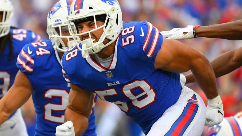 Sep 26, 2021; Orchard Park, New York, USA; Buffalo Bills outside linebacker Matt Milano (58) reacts to his defensive play against the Washington Football Team during the second half at Highmark Stadium. Mandatory Credit: Rich Barnes-USA TODAY Sports