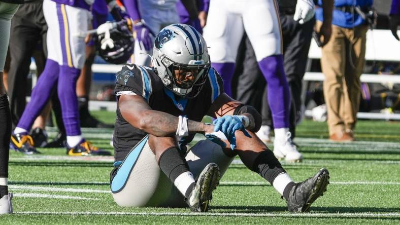 Oct 17, 2021; Charlotte, North Carolina, USA; Carolina Panthers safety Sean Chandler (34) reacts after not being able to stop a winning reception by Minnesota Vikings wide receiver K.J. Osborn (17) in overtime at Bank of America Stadium. Mandatory Credit: Jim Dedmon-USA TODAY Sports