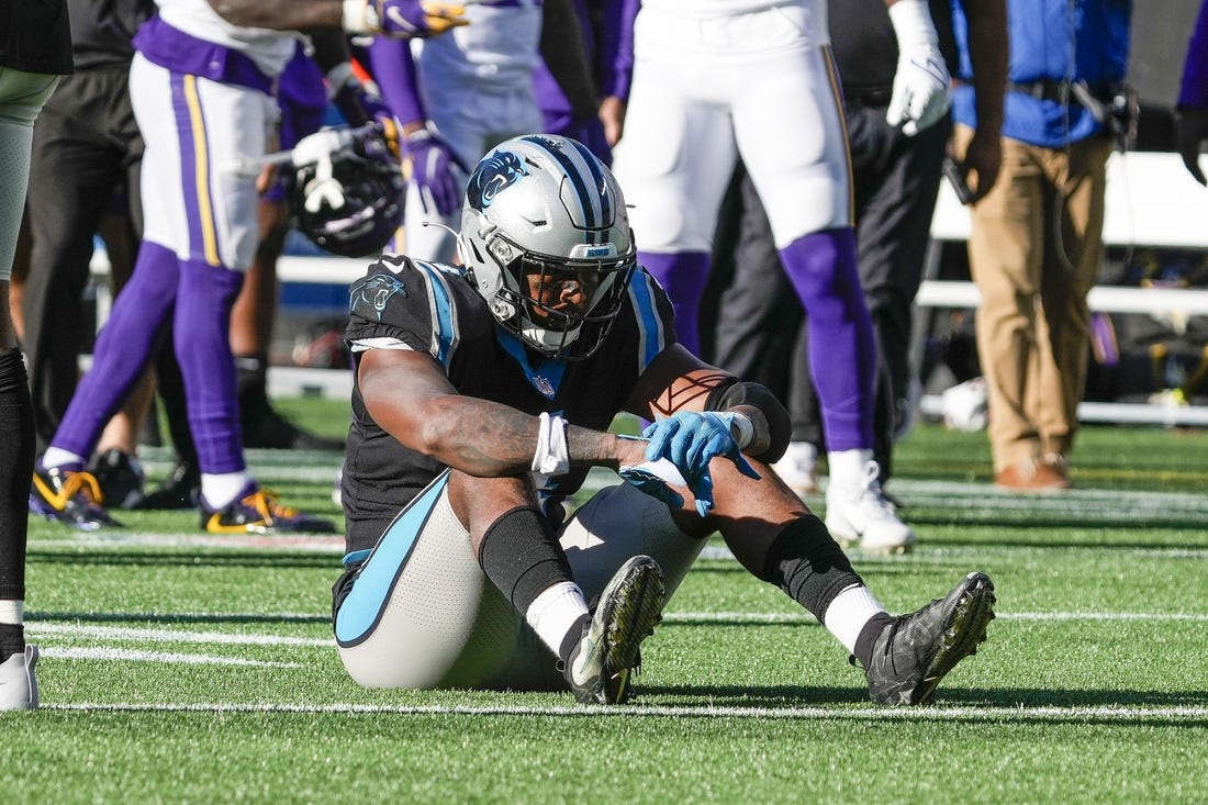 Oct 17, 2021; Charlotte, North Carolina, USA; Carolina Panthers safety Sean Chandler (34) reacts after not being able to stop a winning reception by Minnesota Vikings wide receiver K.J. Osborn (17) in overtime at Bank of America Stadium. Mandatory Credit: Jim Dedmon-USA TODAY Sports