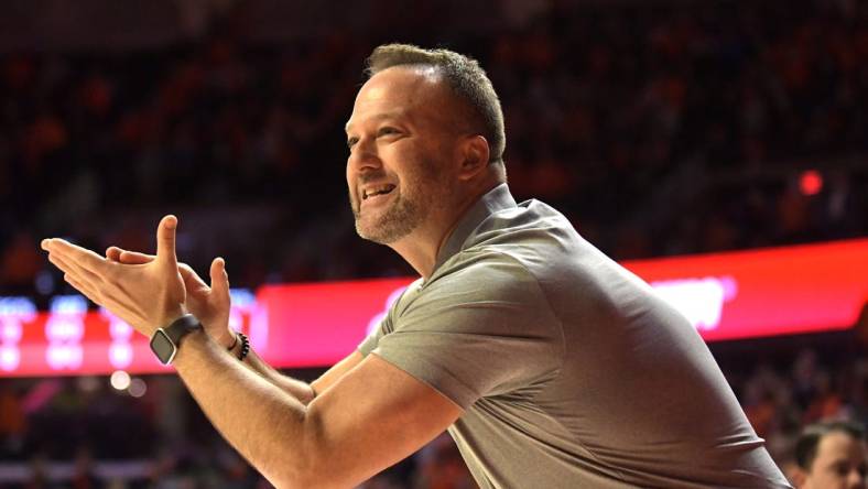 Nov 12, 2021; Champaign, Illinois, USA;  Arkansas State head coach Mike Balado applauds his team in the first half against the Illinois Fighting Illini at State Farm Center. Mandatory Credit: Ron Johnson-USA TODAY Sports