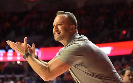 Nov 12, 2021; Champaign, Illinois, USA;  Arkansas State head coach Mike Balado applauds his team in the first half against the Illinois Fighting Illini at State Farm Center. Mandatory Credit: Ron Johnson-USA TODAY Sports