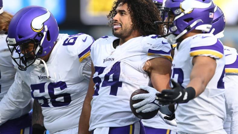 Nov 14, 2021; Inglewood, California, USA;  Minnesota Vikings middle linebacker Eric Kendricks (54) celebrates after he intercepted a pass in the first half against the Los Angeles Chargers at SoFi Stadium. Mandatory Credit: Jayne Kamin-Oncea-USA TODAY Sports