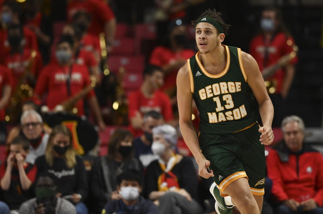 Nov 17, 2021; College Park, Maryland, USA;  George Mason Patriots forward Josh Oduro (13) reacts after making a basket during the second half against the Maryland Terrapins at Xfinity Center. Mandatory Credit: Tommy Gilligan-USA TODAY Sports