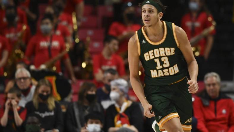 Nov 17, 2021; College Park, Maryland, USA;  George Mason Patriots forward Josh Oduro (13) reacts after making a basket during the second half against the Maryland Terrapins at Xfinity Center. Mandatory Credit: Tommy Gilligan-USA TODAY Sports