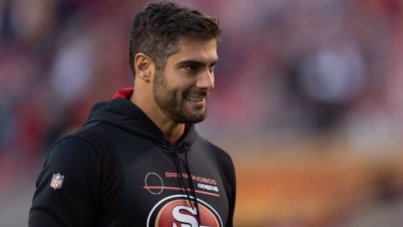 Jan 2, 2022; Santa Clara, California, USA;  San Francisco 49ers quarterback Jimmy Garoppolo (10) reacts after defeating the Houston Texans at Levi's Stadium. Mandatory Credit: Stan Szeto-USA TODAY Sports