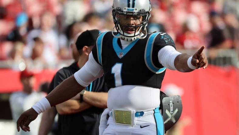 Jan 9, 2022; Tampa, Florida, USA;Carolina Panthers quarterback Cam Newton (1) against the Tampa Bay Buccaneers prior to the game at Raymond James Stadium. Mandatory Credit: Kim Klement-USA TODAY Sports