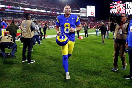 Jan 23, 2022; Tampa, Florida, USA; Los Angeles Rams kicker Matt Gay (8) celebrates after kicking the game winning field goal against the Tampa Bay Buccaneers in a NFC Divisional playoff football game at Raymond James Stadium. Mandatory Credit: Kim Klement-USA TODAY Sports