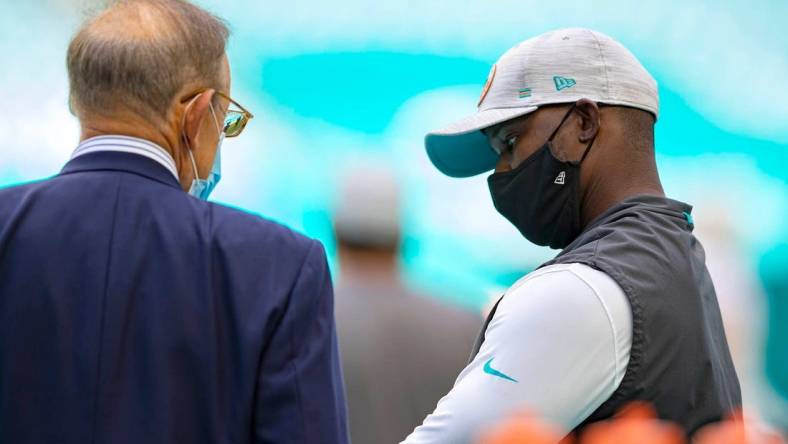 Miami Dolphins owner Stephen Ross talks with Miami Dolphins head coach Brian Flores at Hard Rock Stadium in Miami Gardens, October 18, 2020.

Dolphins Owner Stephen M Ross 06