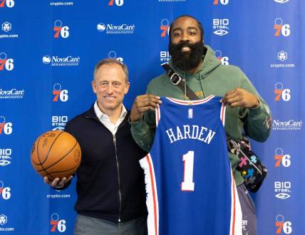Feb 15, 2022; Camden, NJ, USA; Philadelphia 76ers guard James Harden (1) and owner Josh Harris (L) pose for a photo after speaking with the media at Philadelphia 76ers Training Complex. Mandatory Credit: Bill Streicher-USA TODAY Sports