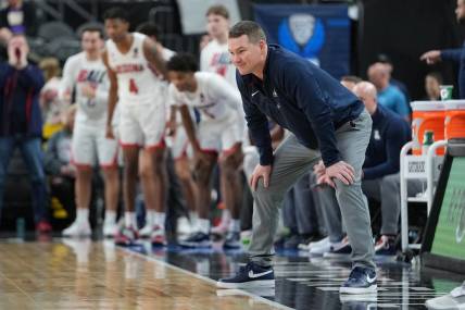 Mar 10, 2022; Las Vegas, NV, USA; Arizona Wildcats coach Tommy Lloyd is pictured in a game against the Stanford Cardinal during the second half at T-Mobile Arena. Mandatory Credit: Stephen R. Sylvanie-USA TODAY Sports