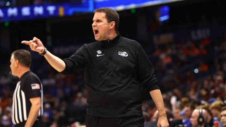 Mar 11, 2022; Tampa, FL, USA; LSU Tigers head coach Will Wade against the Arkansas Razorbacks during the first half at Amalie Arena. Mandatory Credit: Kim Klement-USA TODAY Sports