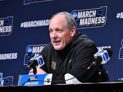Mar 16, 2022; Buffalo, NY, USA; Vermont Catamounts head coach John Becker talks with the press before a practice session for the first round of the 2022 NCAA Tournament at KeyBank Center. Mandatory Credit: Mark Konezny-USA TODAY Sports