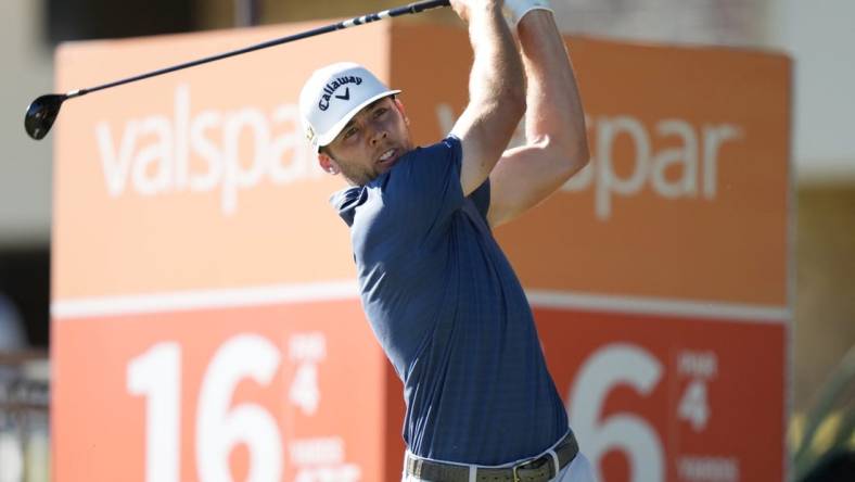 Mar 20, 2022; Palm Harbor, Florida, USA; Sam Burns tees off on the 16th hole during the final round of the Valspar Championship golf tournament. Mandatory Credit: Jasen Vinlove-USA TODAY Sports