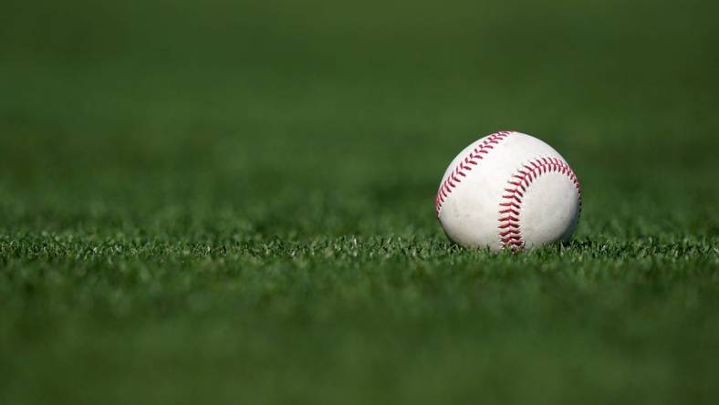 Detail view of a baseball in foul territory during a spring training game between the Cincinnati Reds and the Los Angeles Dodgers, Tuesday, March 22, 2022, at Camelback Ranch in Glendale, Ariz.

Cincinnati Reds At Los Angeles Dodgers March 22 0376